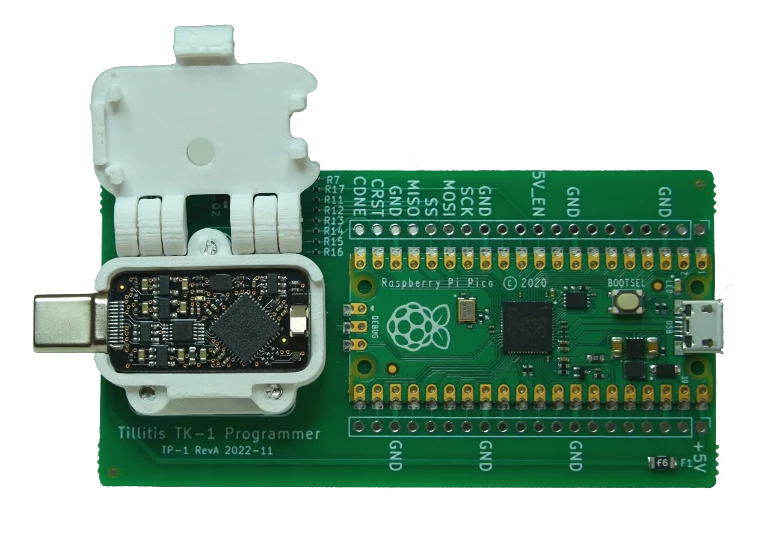 TKey Programmer board showing TKey placed in holder